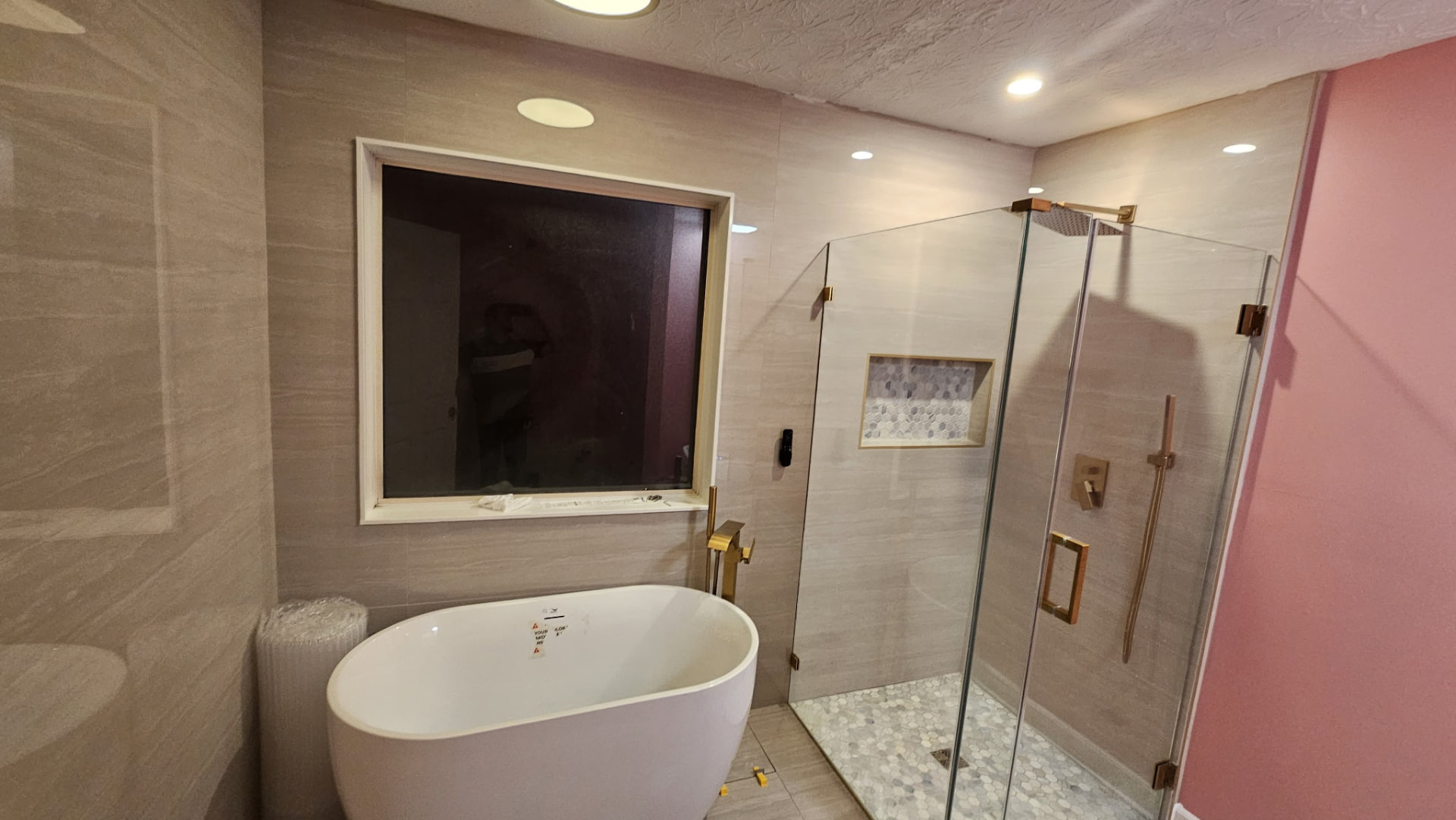 Freestanding tub & glass shower — Bathroom Remodeling project by LV Remodeling & Construction